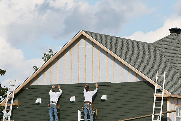 Professional Siding Installation technician working in Sunbury, NC